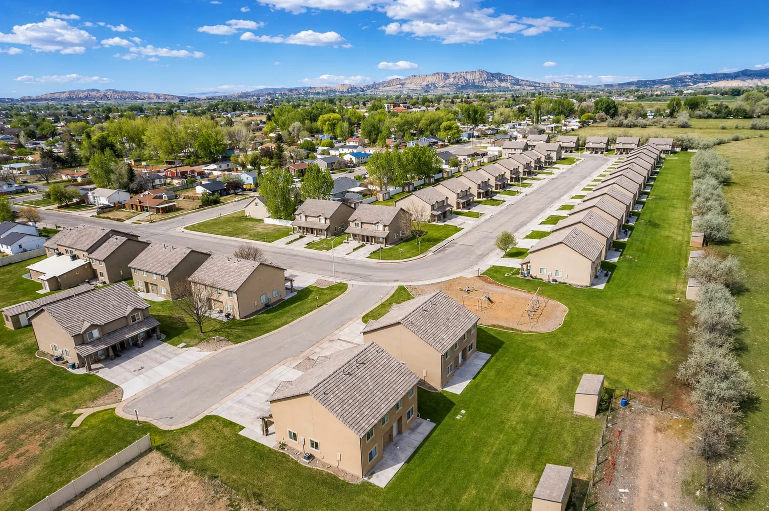 Aerial view over the full Spring Creek townhome community