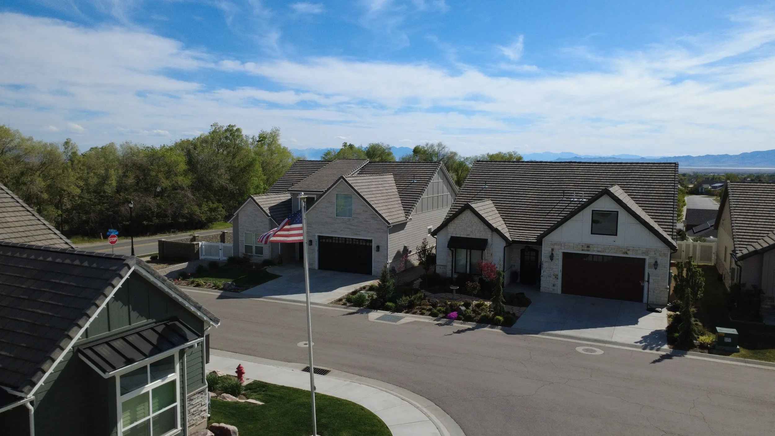 Wide aerial showing the community within the surrounding neighborhood