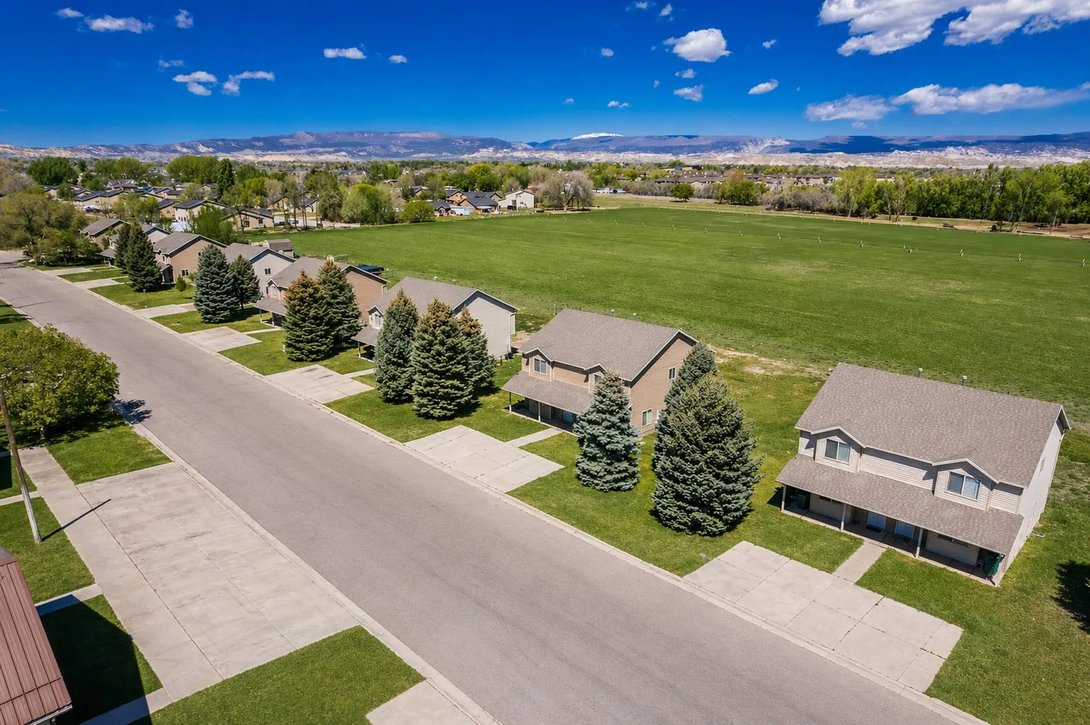 Farm Street Townhomes — An 18-unit residential community in Vernal with generous green space and a clean, well-planned site layout.