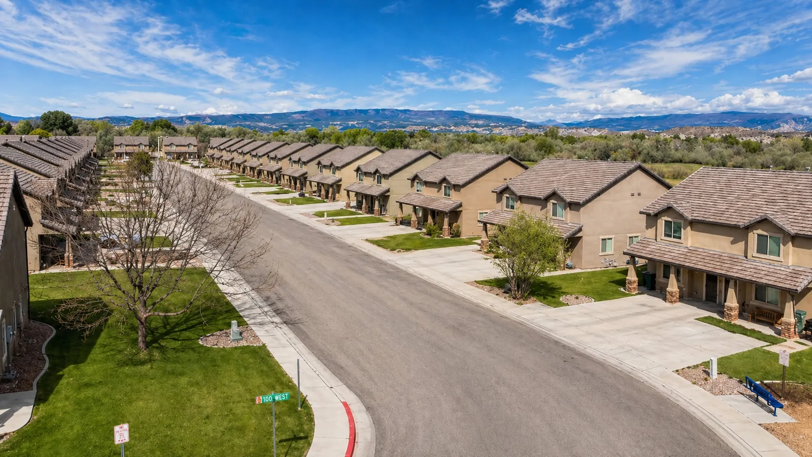 Spring Creek — A 70-unit townhome community built around a genuine amenity package — clubhouse, swim spa, fitness space, and outdoor recreation.